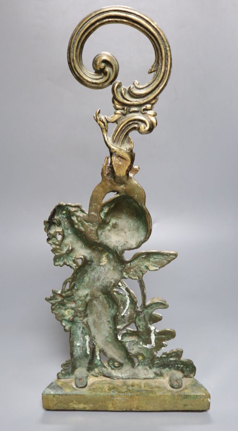 A Victorian brass cherub door stop, height 49cm
